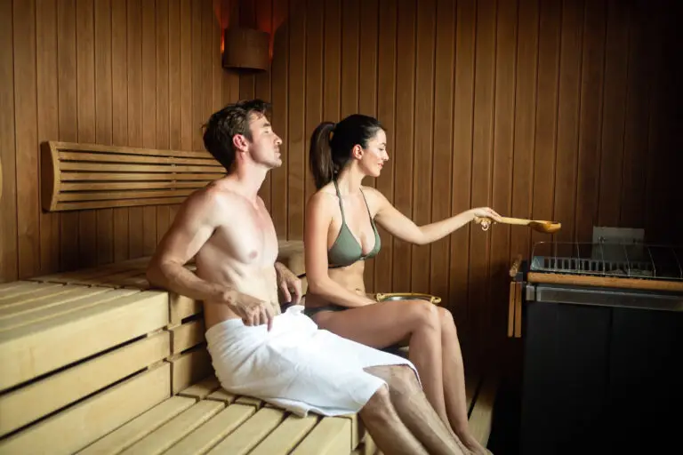 Young happy couple relaxing at spa resort hotel luxury